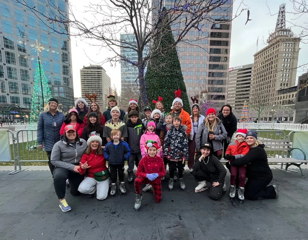Group of attendees from Camp Tuttle ice skating