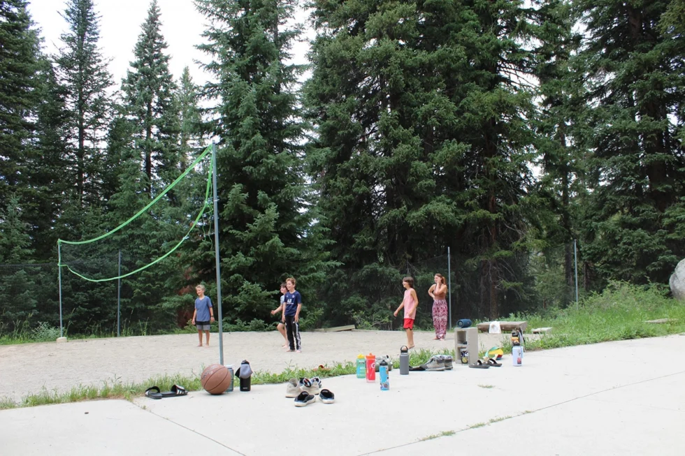 Children playing volleyball at Camp Tuttle