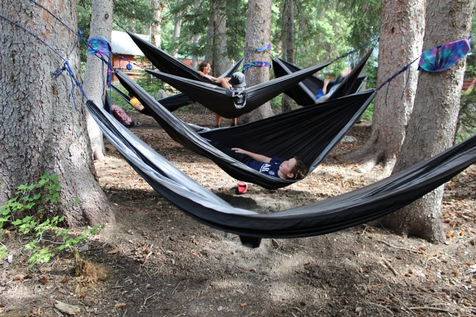 Campers in hammocks at Camp Tuttle